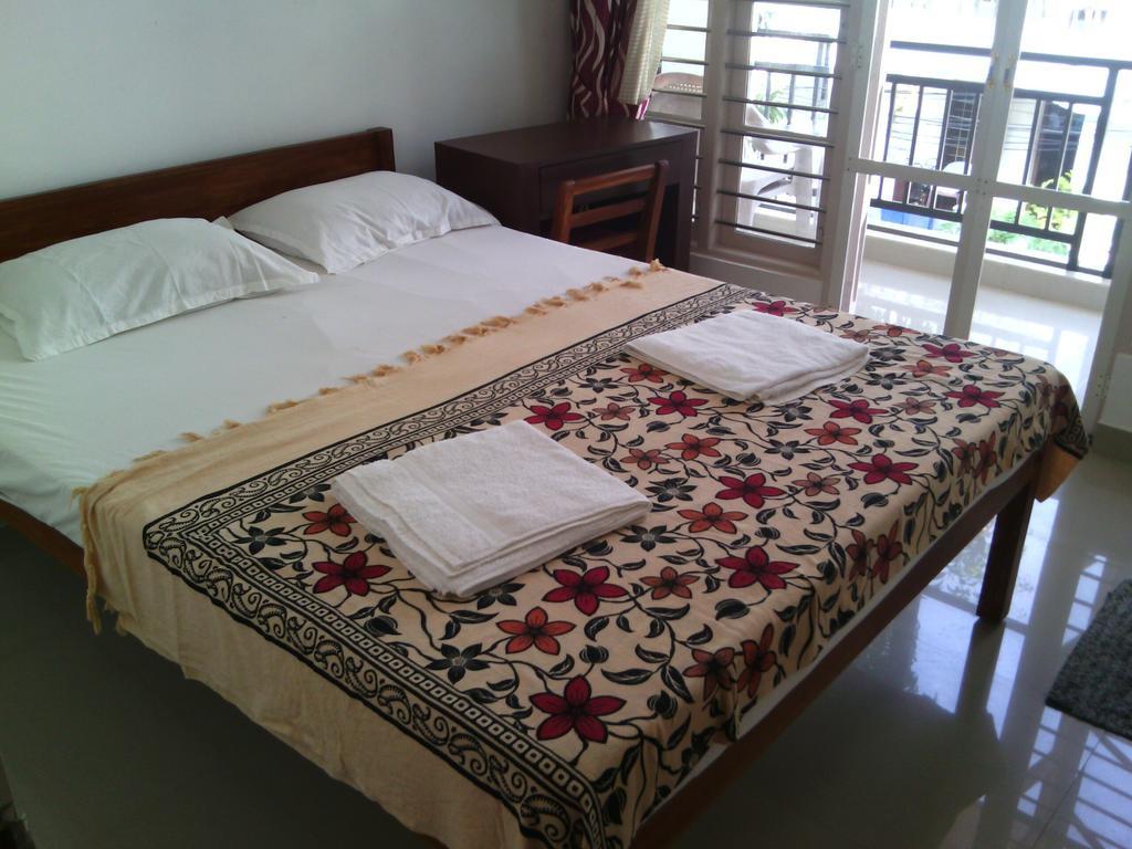 Nathans Holiday Home Kochi Habitación foto